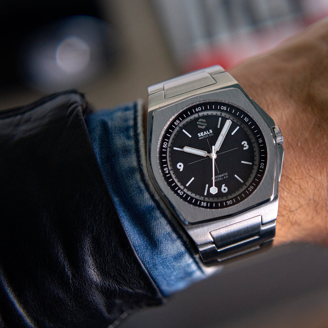 Integrated Steel Sport Watch by Seals Watch Company With Black and White Accented Dial