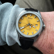 Yellow Watch on the Wrist Designed in California by Seals Watch Company