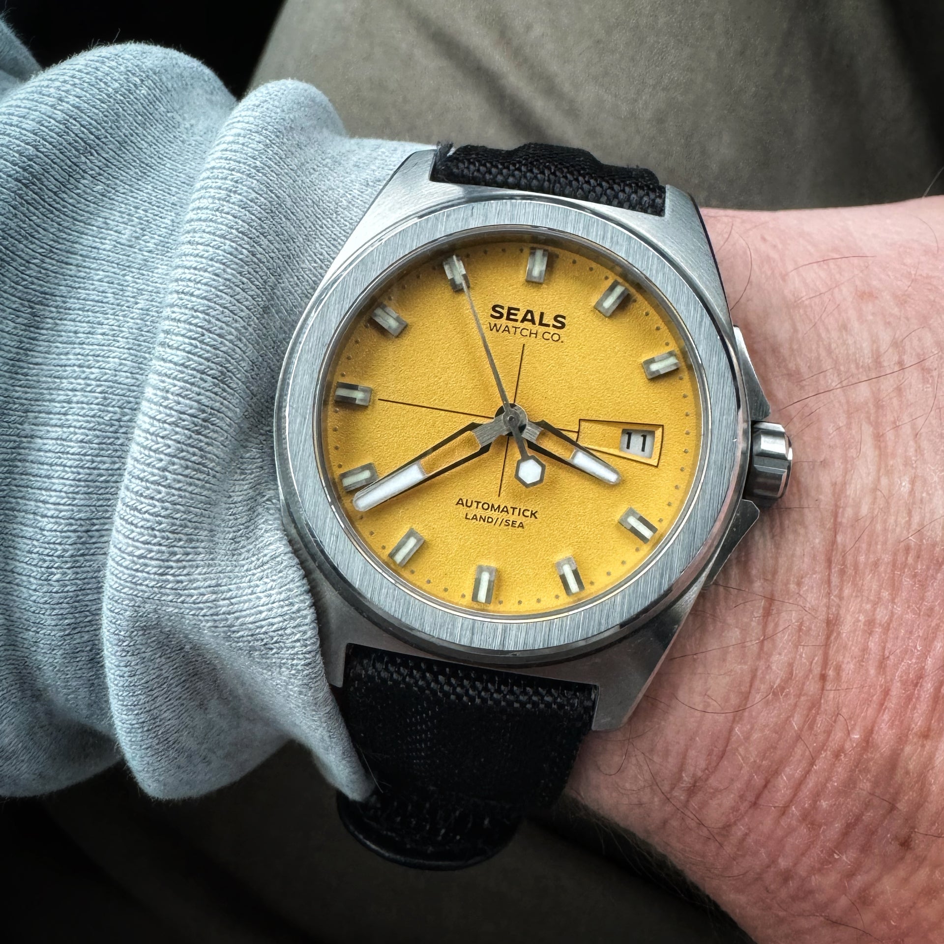 Yellow Watch on the Wrist Designed in California by Seals Watch Company