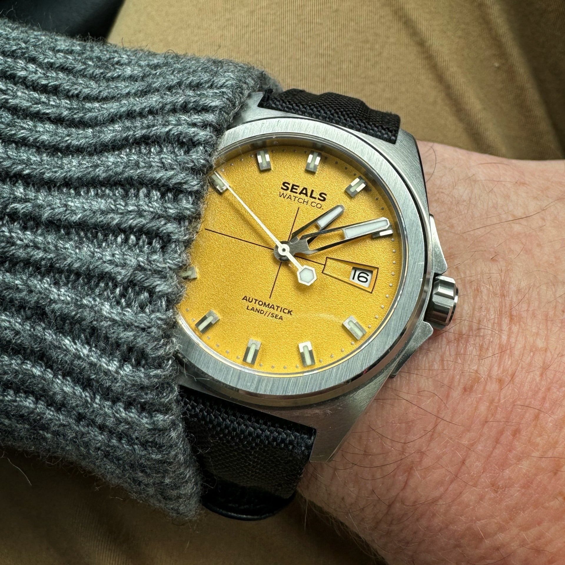 Land // Sea Yellow and Black Automatic Watch by Seals Watch Company on the Wrist